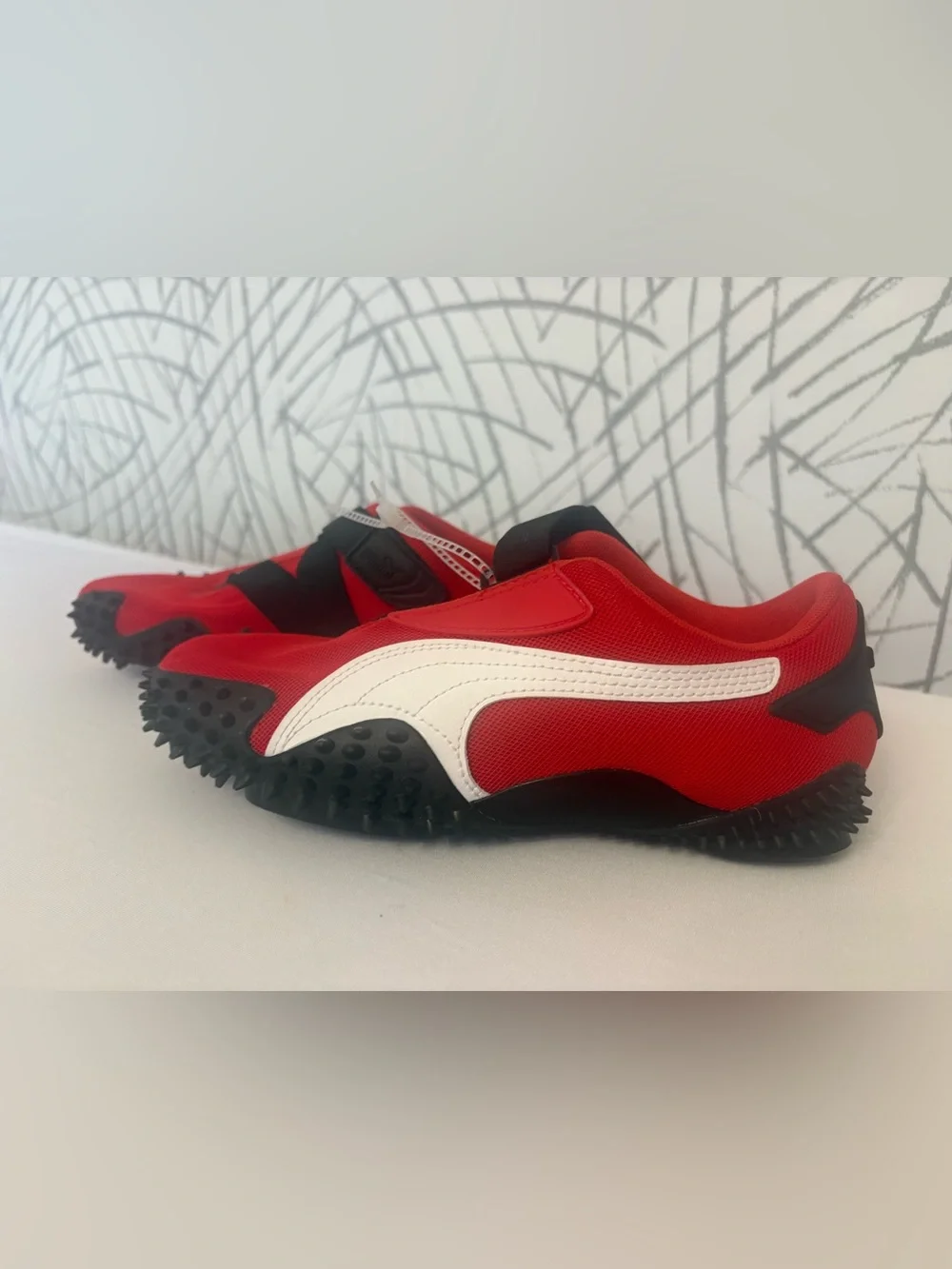 PUMA Mostro OG Sneakers. Vibrant  Red with a Unique Spike Sole.